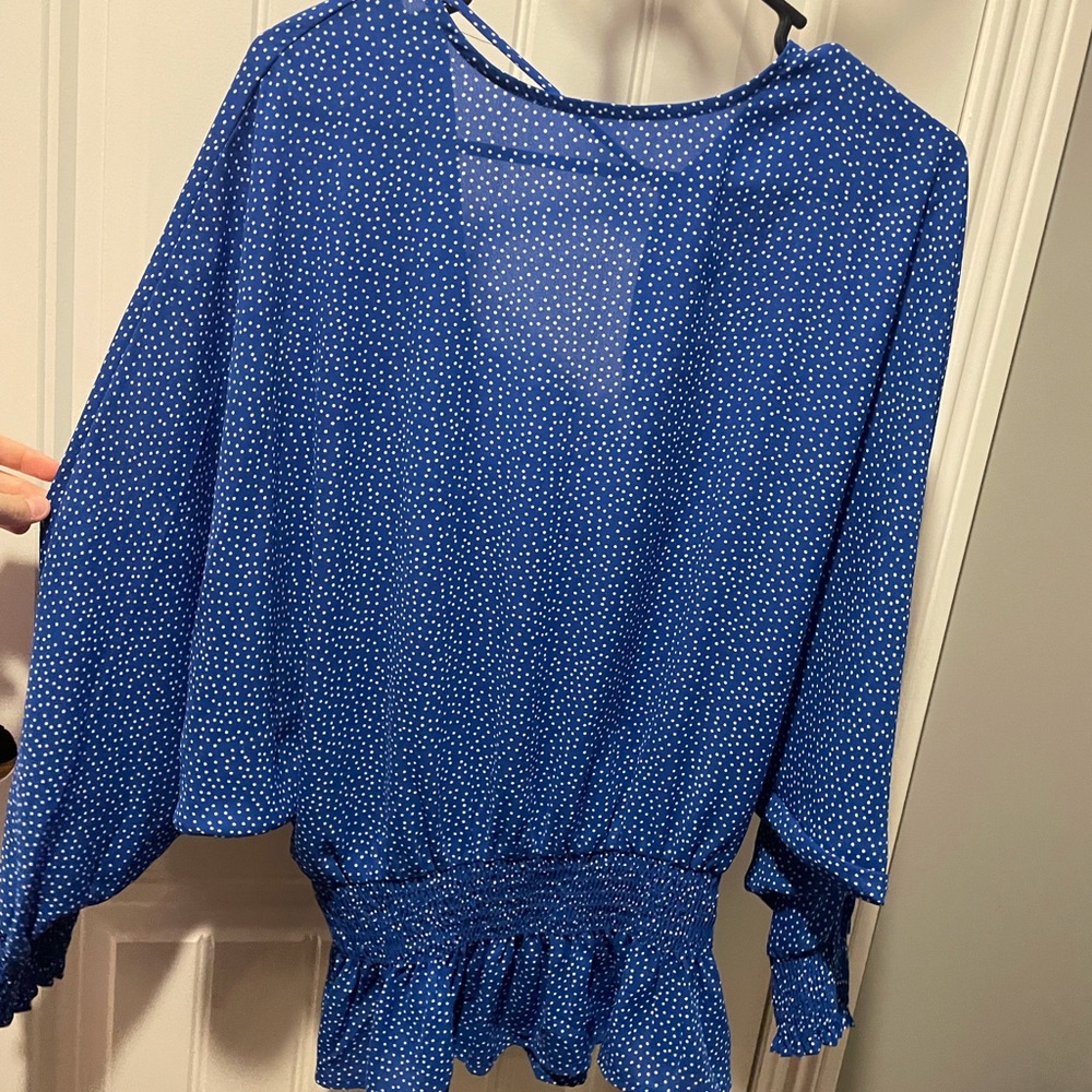 Polka dot blue and white long sleeve top